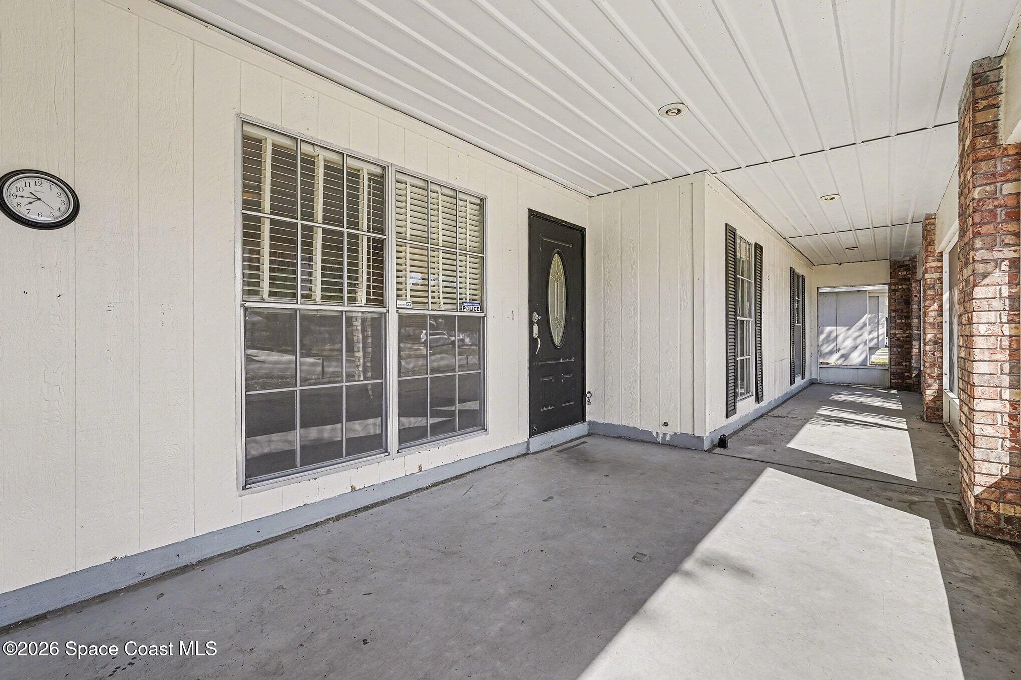 3205 Dade Circle Northeast Palm Bay, FL 32905 - Photo 2 of 35 a view of empty room with windows