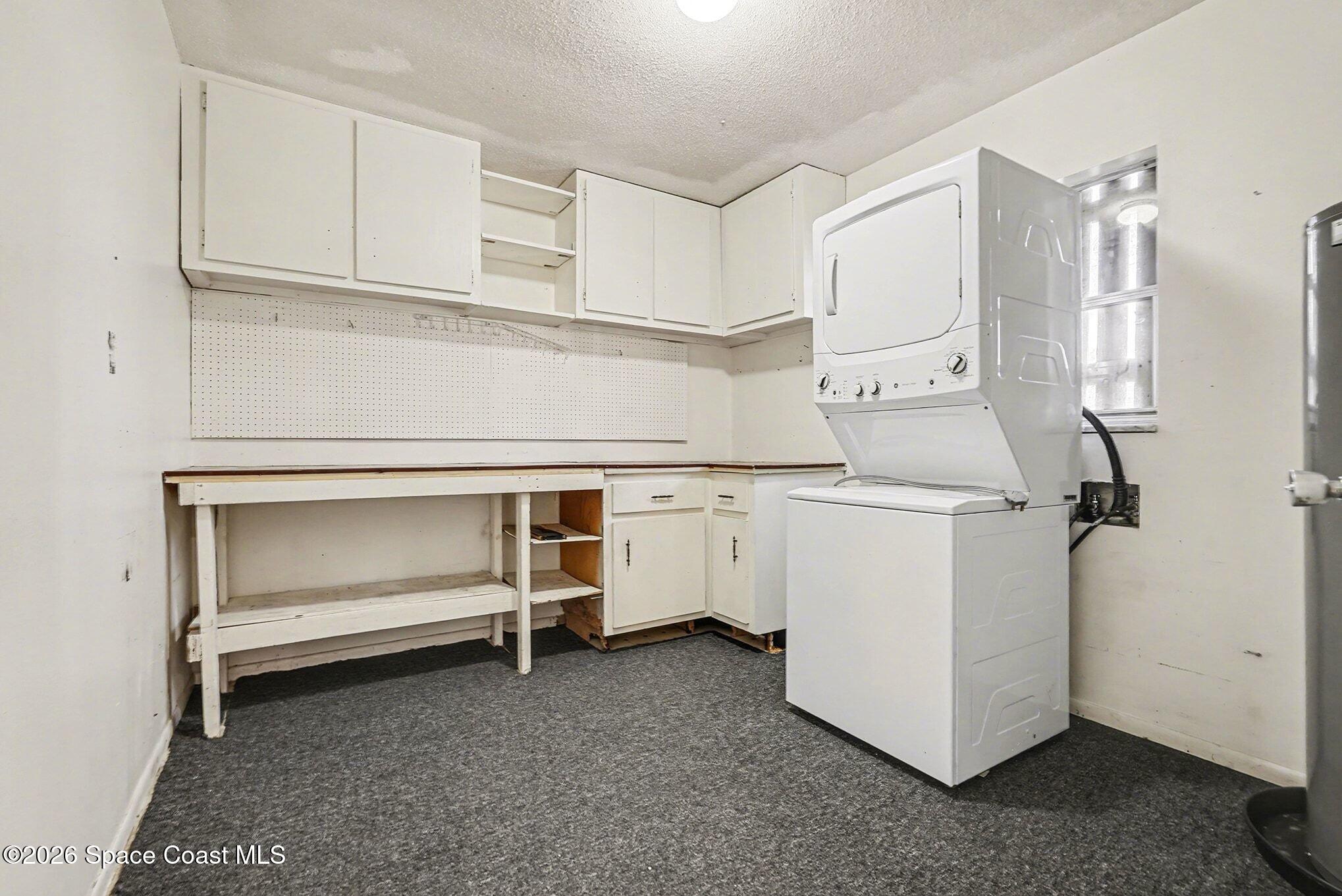 3205 Dade Circle Northeast Palm Bay, FL 32905 - Photo 21 of 35 a utility room with dryer and washer