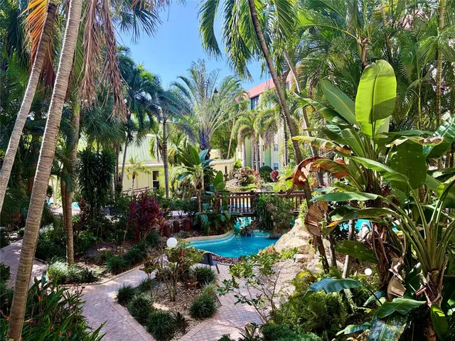 a view of a park with a tree