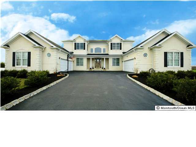 2 Grant Drive Cream Ridge, NJ 08514 - Photo 1 of 3 a black and white photo of a house with a yard