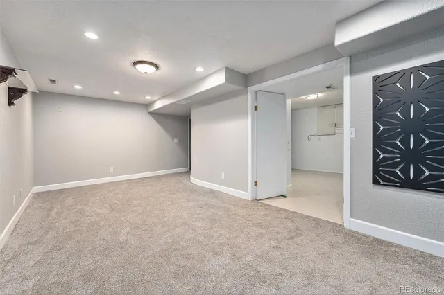 an empty room with a natural light