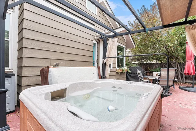 a sink with wooden cabinet