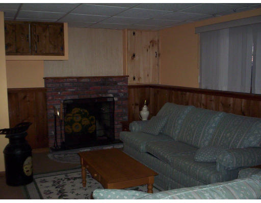 60 Dodge Road Sutton, MA 01590 - Photo 14 of 16 a living room with furniture and a fireplace