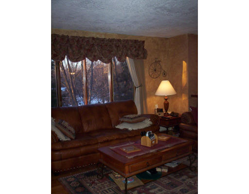 60 Dodge Road Sutton, MA 01590 - Photo 4 of 16 a living room with furniture and a lamp