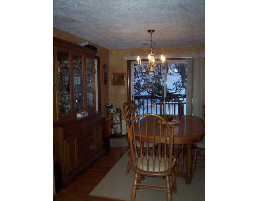 60 Dodge Road Sutton, MA 01590 - Photo 5 of 16 a view of a dining room with furniture and chandelier