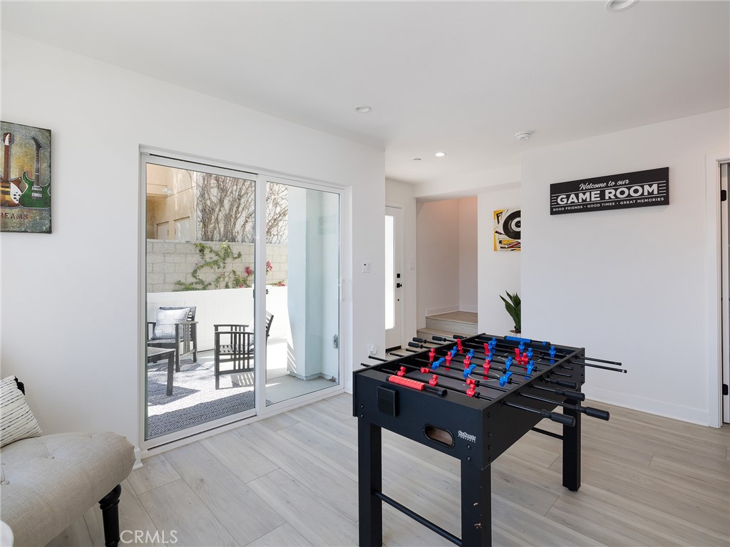 121 East 223rd Street, Unit 1 Carson, CA 90745 - Photo 23 of 35 a living room with furniture and a table