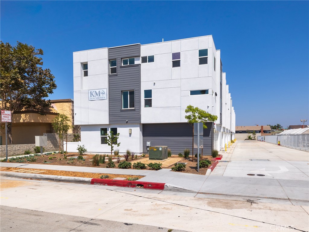 121 East 223rd Street, Unit 1 Carson, CA 90745 - Photo 32 of 35 a view of the house with outdoor space