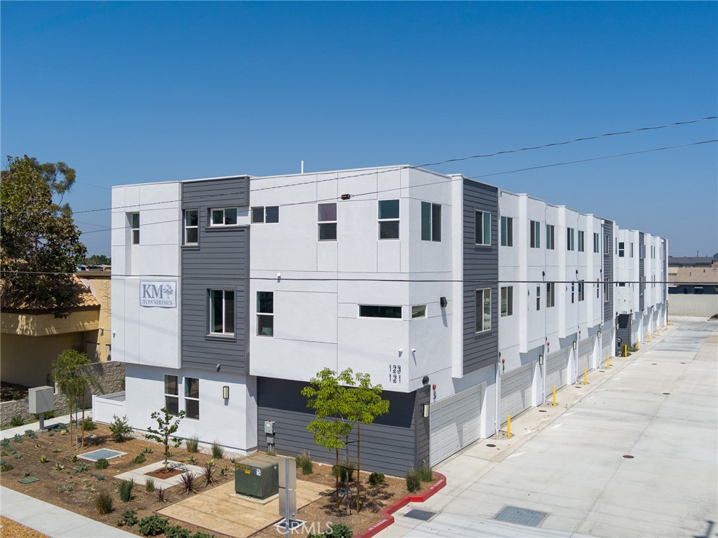 121 East 223rd Street, Unit 1 Carson, CA 90745 - Photo 33 of 35 a large building with a street