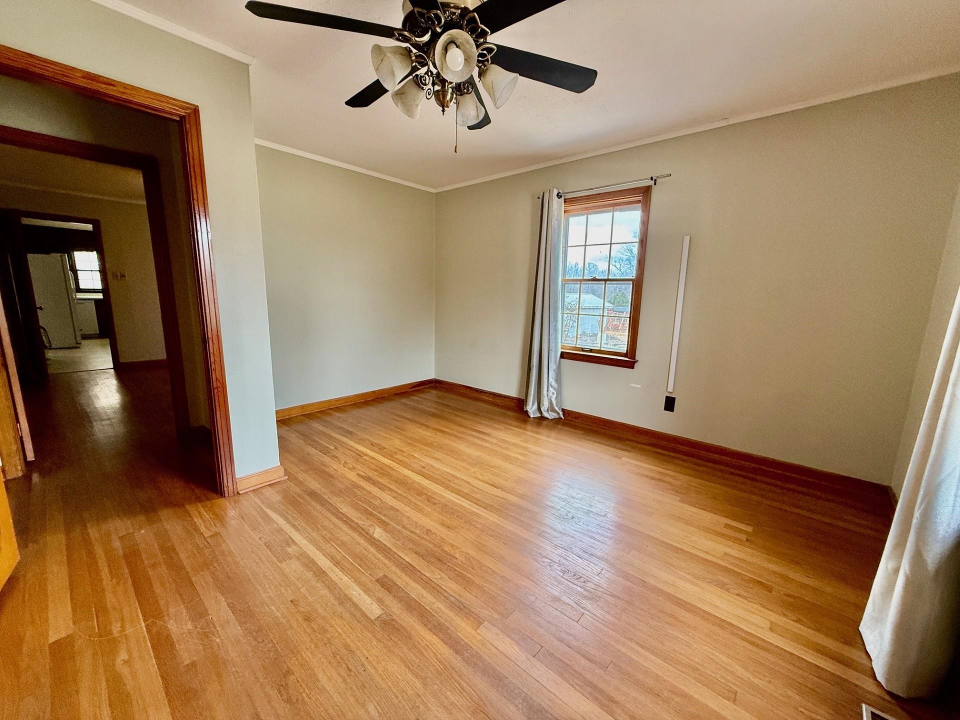 1880 Atoka Idaville Road Atoka, TN 38004 - Photo 14 of 15 a view of empty room with wooden floor