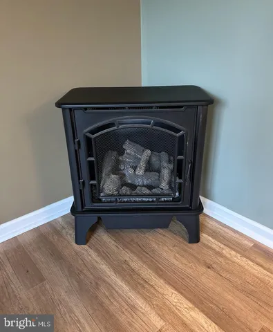 a living room with a fireplace