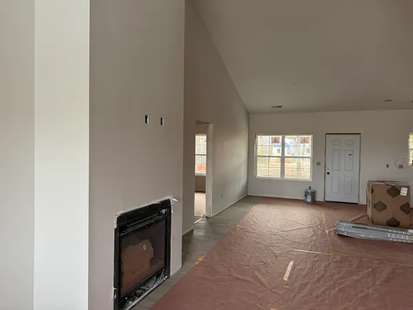 an empty room with windows