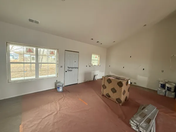 a view of a livingroom with a window