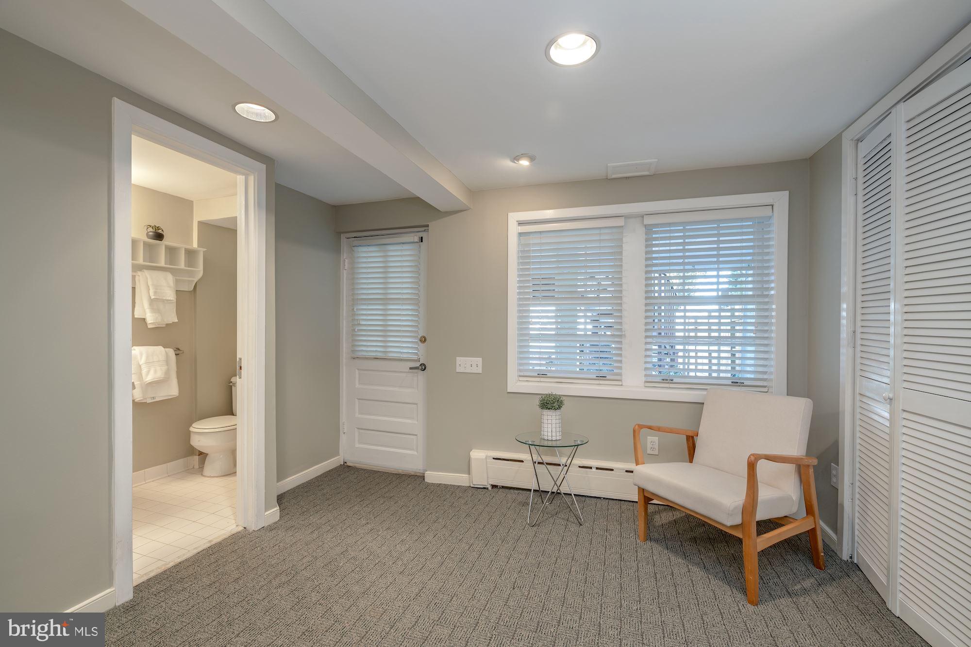 1919 38th Street Northwest Washington, DC 20007 - Photo 25 of 43 Lower level w/ rear exit to covered terrace