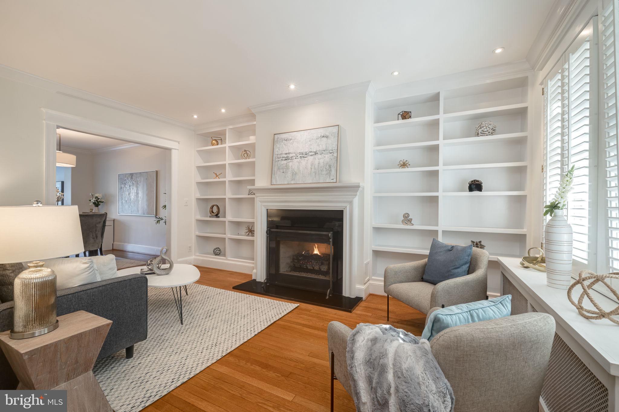 1919 38th Street Northwest Washington, DC 20007 - Photo 4 of 43 Living room w/ gas fireplace & custom built-ins