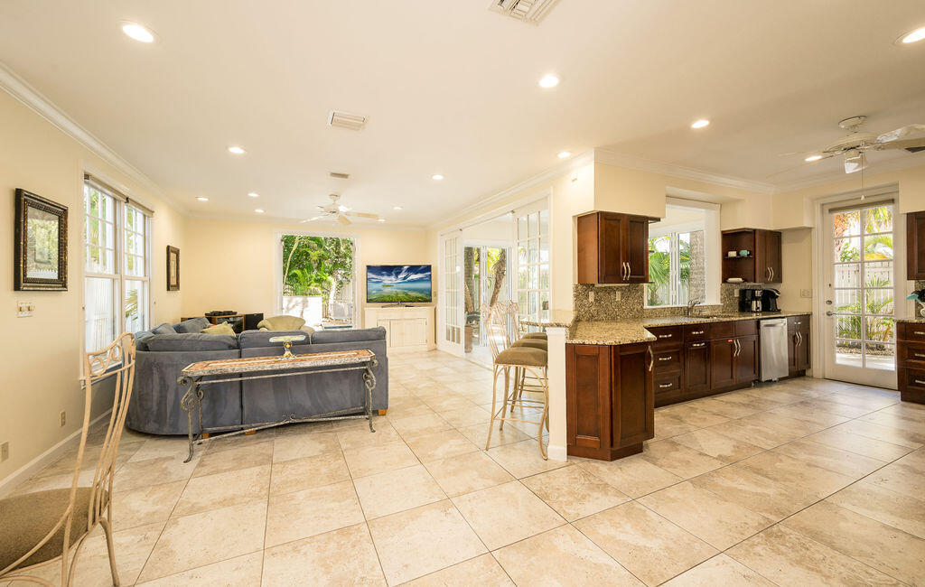 202 Admirals Lane Key West, FL 33040 - Photo 21 of 57 a large kitchen with stainless steel appliances lots of counter top space