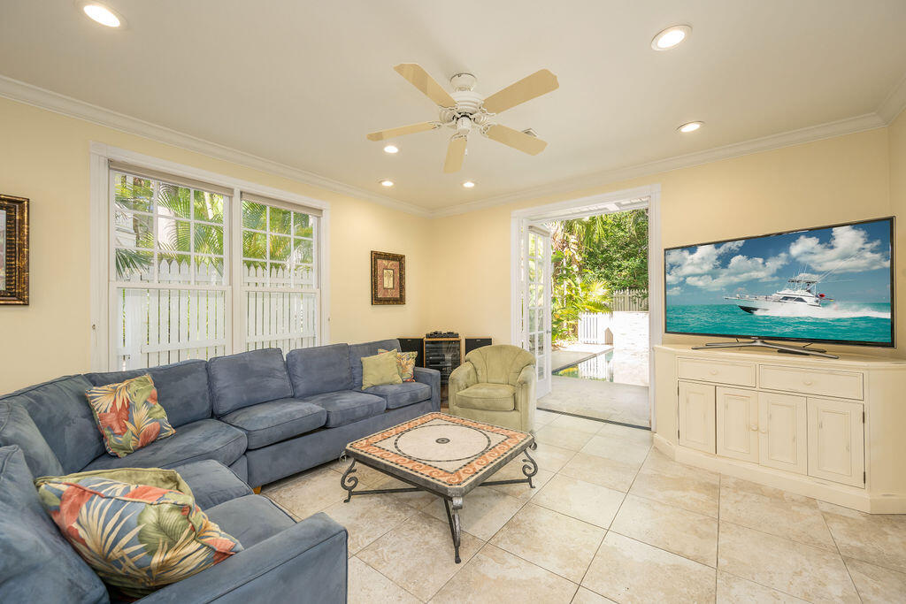 202 Admirals Lane Key West, FL 33040 - Photo 23 of 59 a living room with furniture and a large window