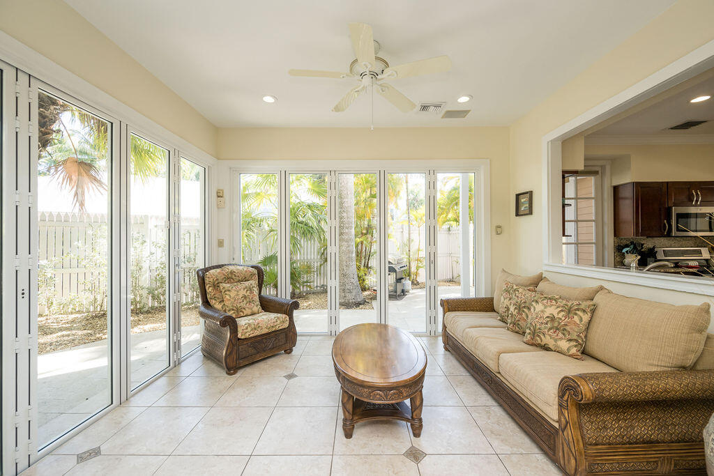 202 Admirals Lane Key West, FL 33040 - Photo 26 of 57 a living room with furniture and a large window