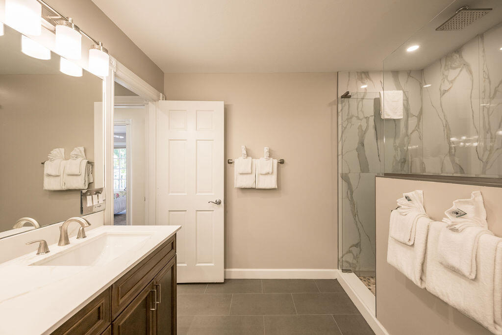 202 Admirals Lane Key West, FL 33040 - Photo 44 of 59 a bathroom with a sink and a mirror