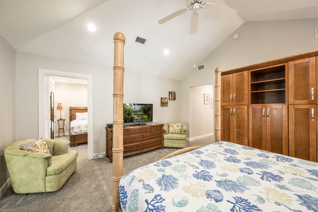 202 Admirals Lane Key West, FL 33040 - Photo 46 of 59 a bedroom with a bed and a couch