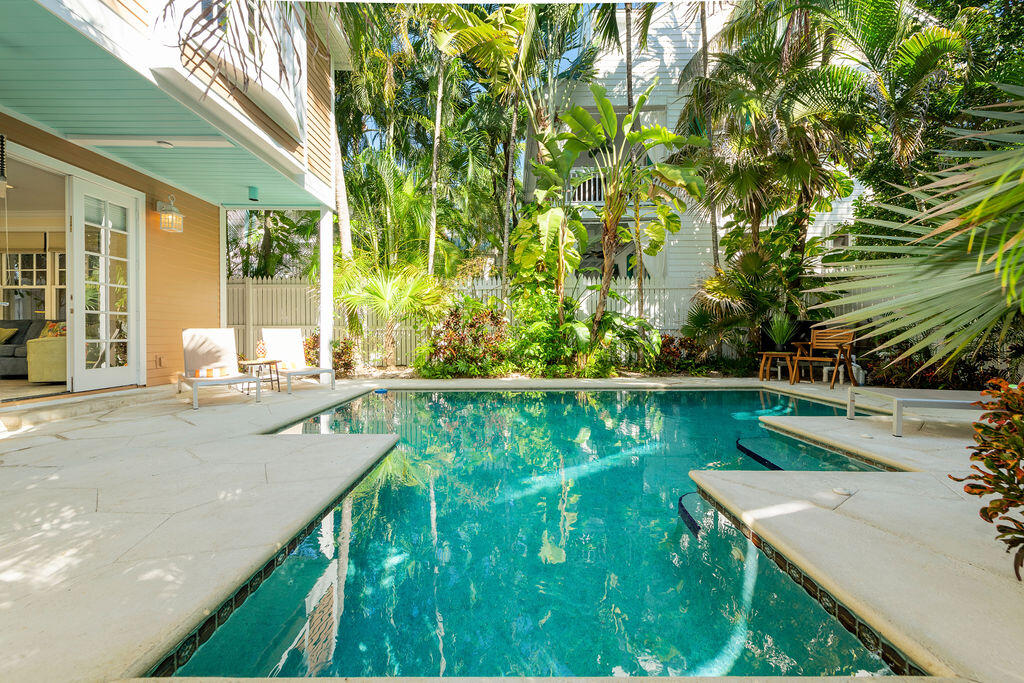 202 Admirals Lane Key West, FL 33040 - Photo 8 of 59 a view of swimming pool from a balcony