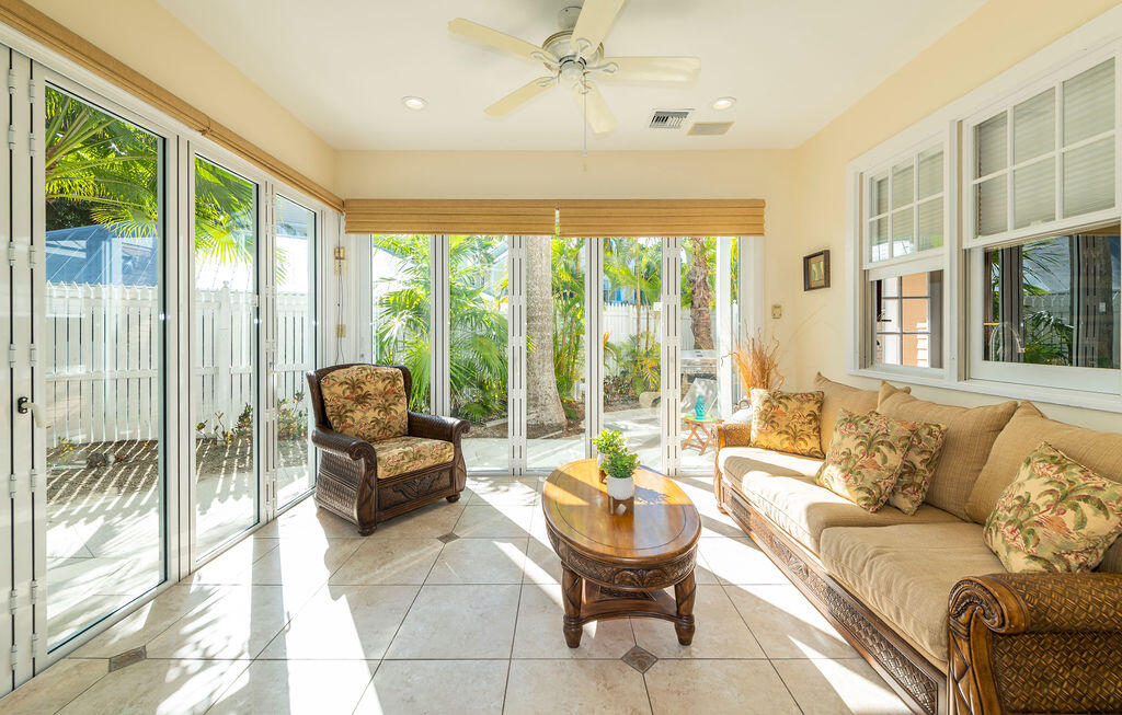 202 Admirals Lane Key West, FL 33040 - Photo 9 of 57 a living room with furniture and a large window