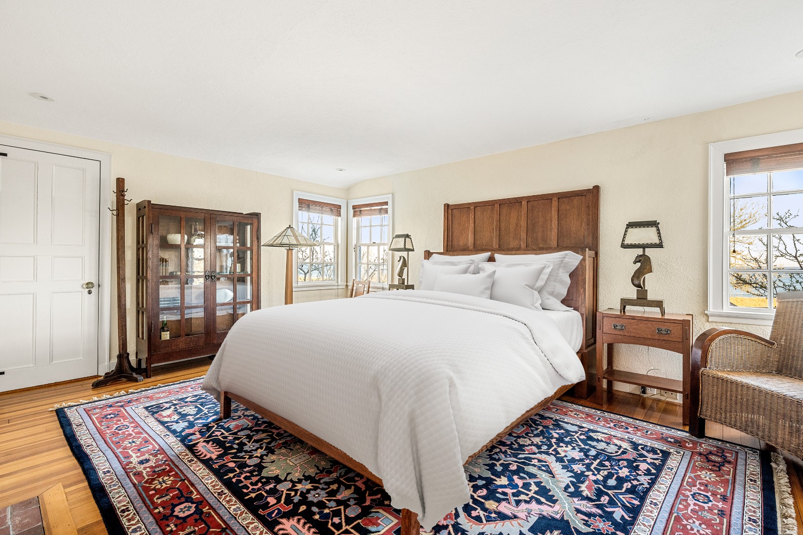 1 Ocean Avenue Nantucket, MA 02554 - Photo 23 of 49 a bedroom with large bed and a rug