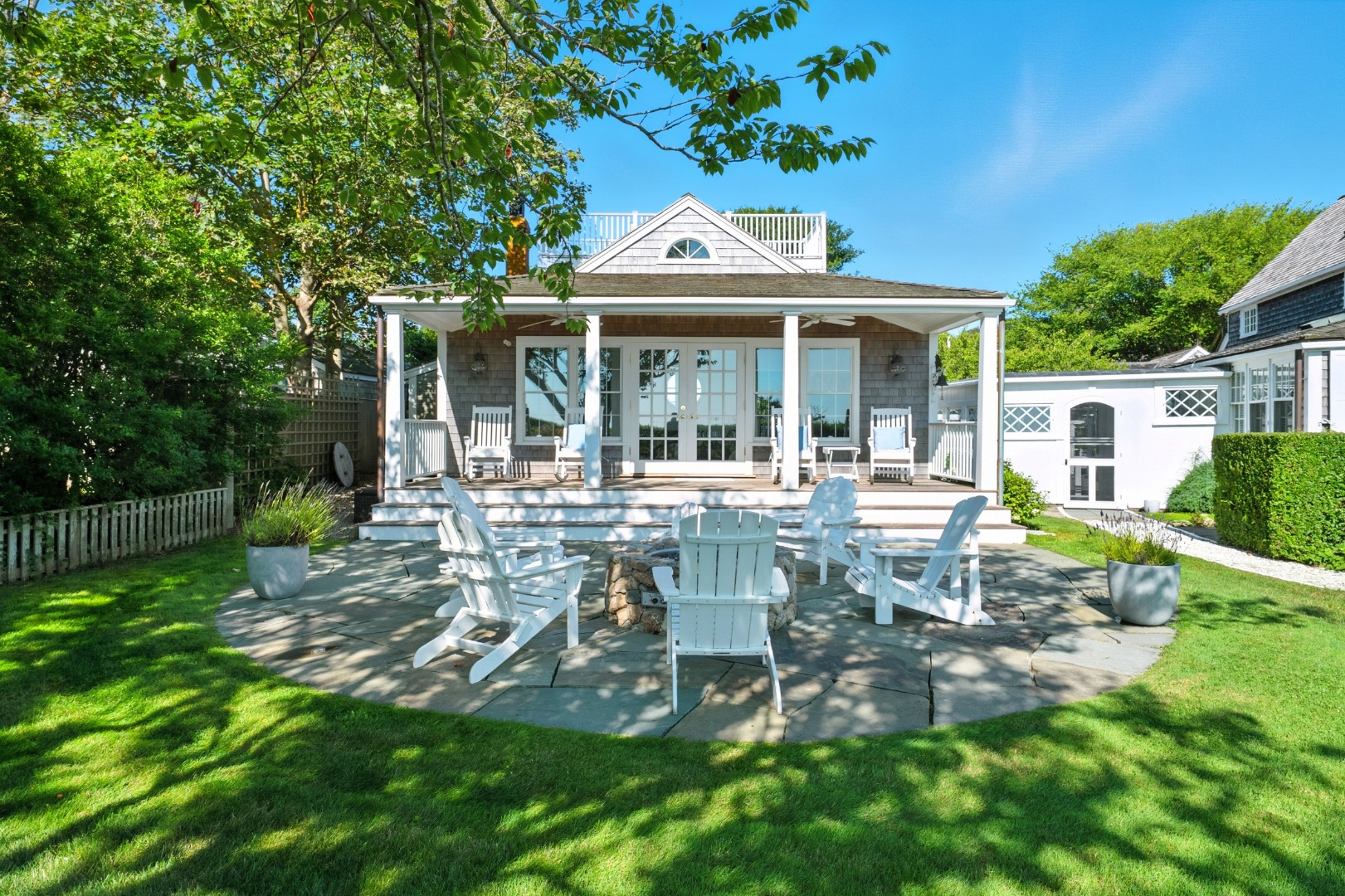 1 Ocean Avenue Nantucket, MA 02554 - Photo 29 of 49 a view of a house with backyard and sitting area