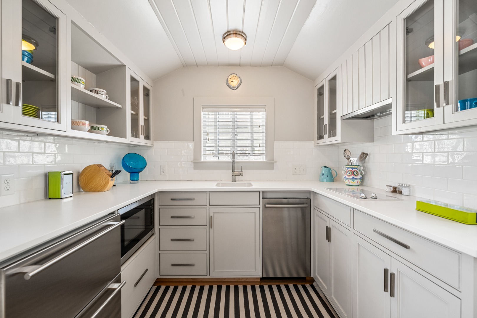 1 Ocean Avenue Nantucket, MA 02554 - Photo 37 of 49 a kitchen that has a sink and a stove in it