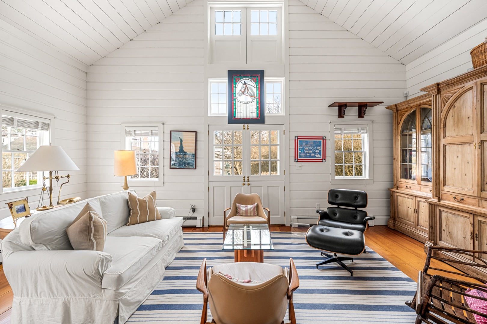 1 Ocean Avenue Nantucket, MA 02554 - Photo 41 of 49 a living room with furniture fireplace and a window