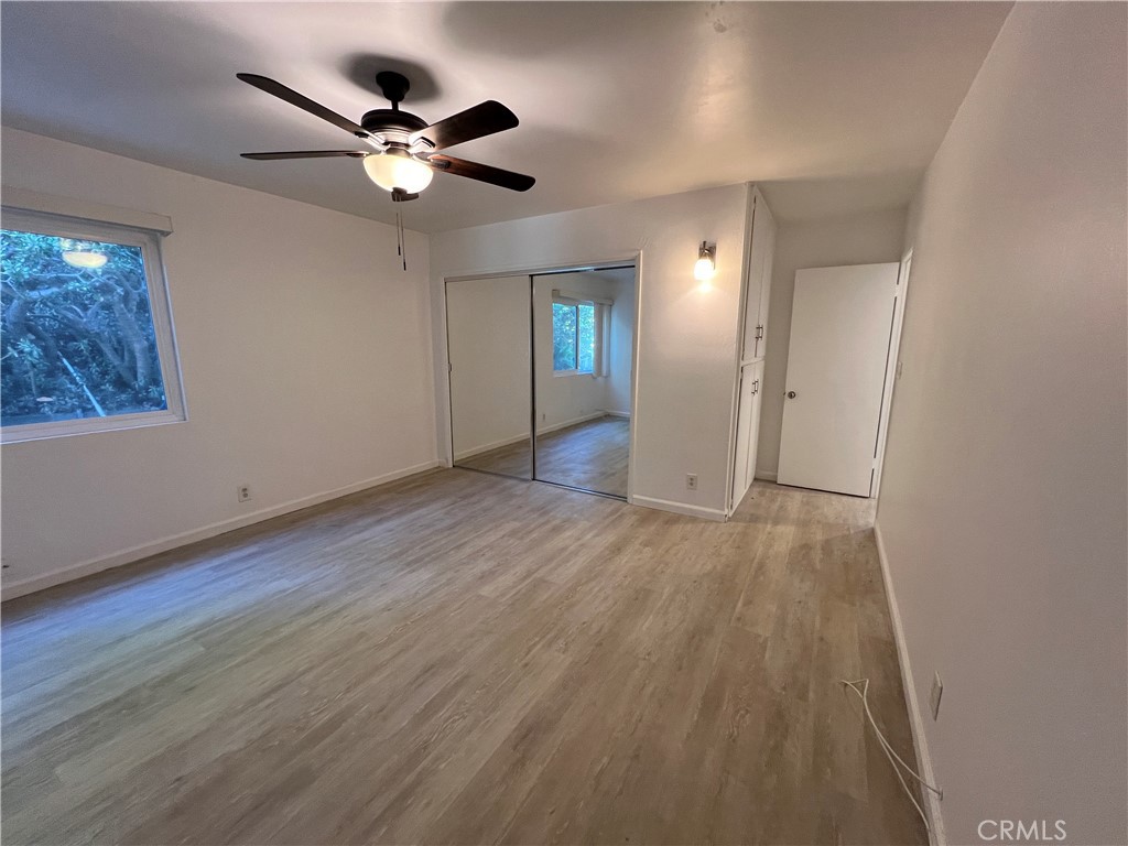 25091 La Cresta Drive, Unit B Dana Point, CA 92629 - Photo 15 of 30 wooden floor in an empty room with a window