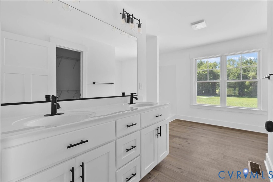 20055 Log Road Disputanta, VA 23842 - Photo 24 of 27 a bathroom with a sink and a window