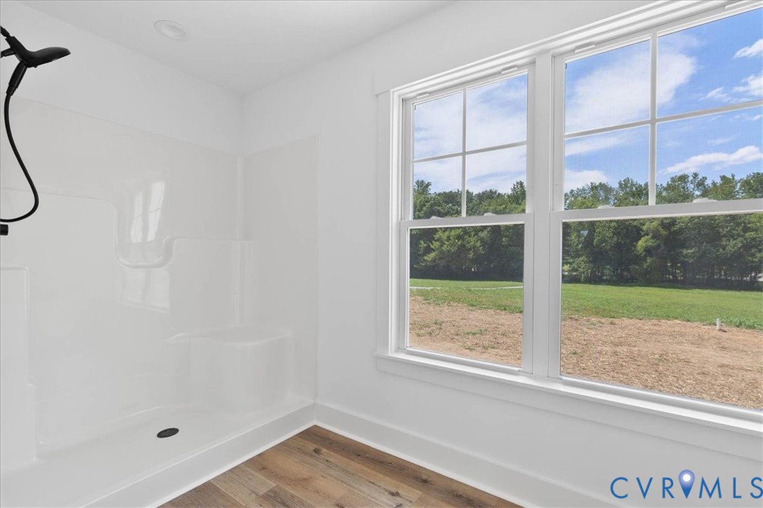 20055 Log Road Disputanta, VA 23842 - Photo 26 of 27 a view of a room that has a window and wooden floor