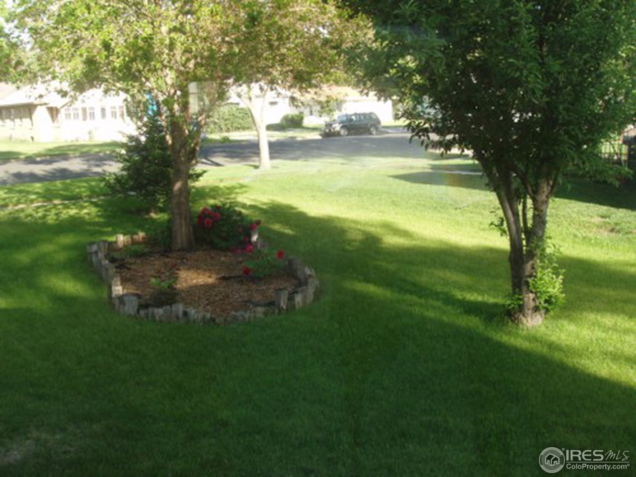 521 Lincoln Street Fort Morgan, CO 80701 - Photo 4 of 12 a view of swimming pool with a garden