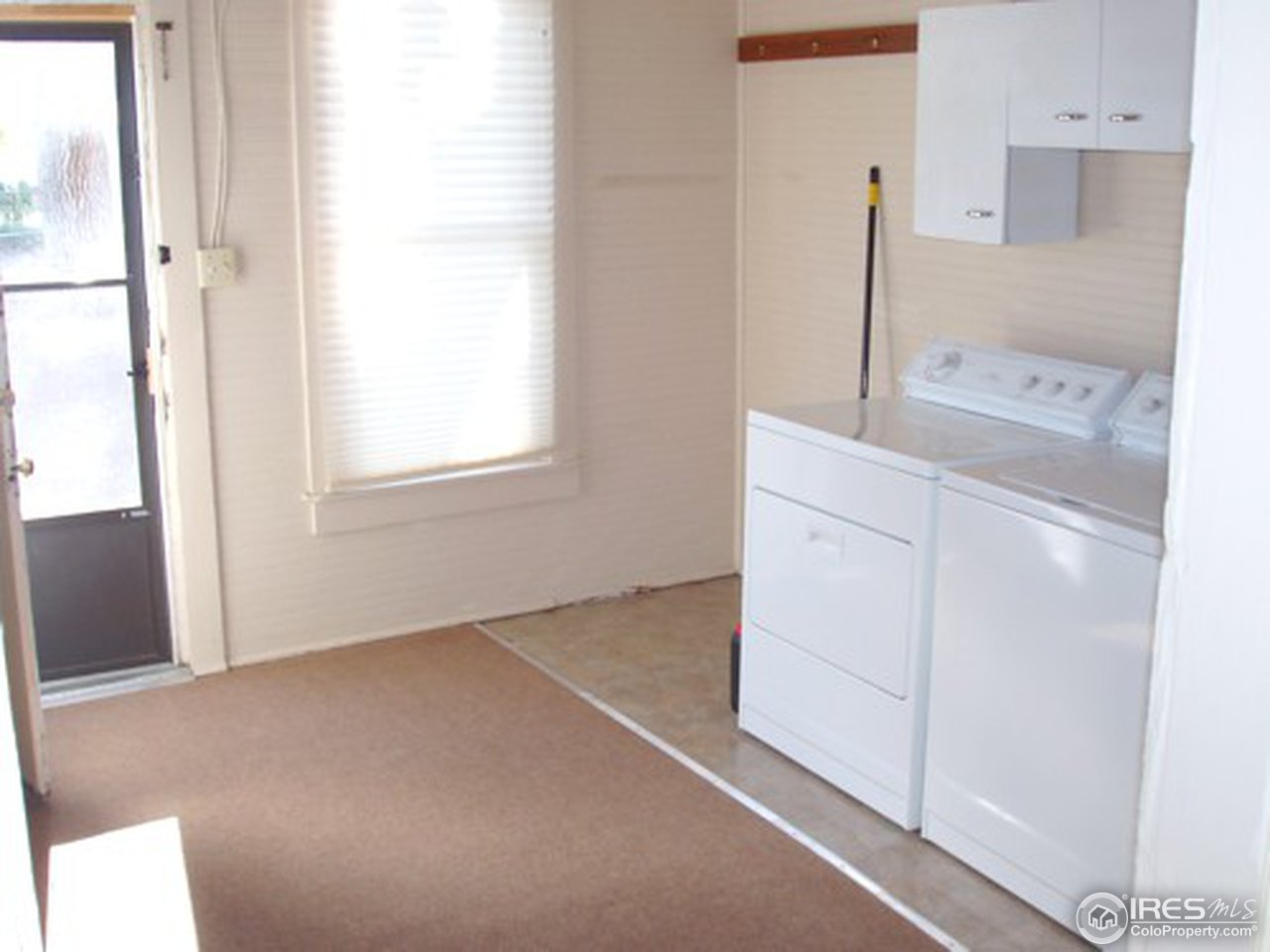 521 Lincoln Street Fort Morgan, CO 80701 - Photo 10 of 12 a view of an empty room and window