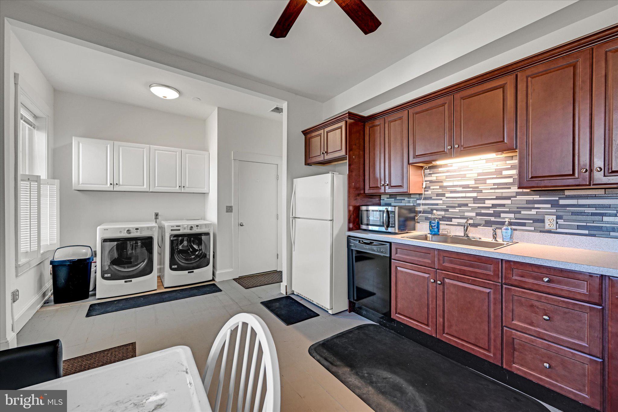 1530 New Holland Road Reading, PA 19607 - Photo 10 of 28 a kitchen with stainless steel appliances granite countertop a refrigerator a stove a sink and dishwasher