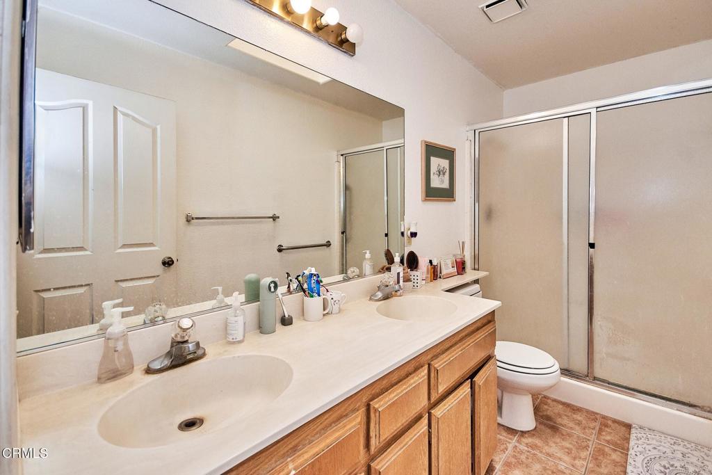 9527 Riggins Road Phelan, CA 92371 - Photo 15 of 49 a bathroom with a sink toilet tub and shower