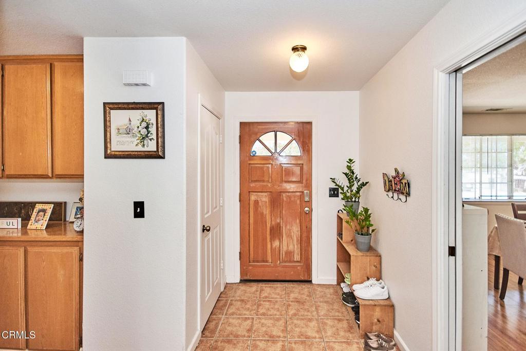 9527 Riggins Road Phelan, CA 92371 - Photo 4 of 49 a view of an entryway with wooden floor