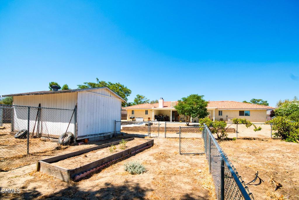 9527 Riggins Road Phelan, CA 92371 - Photo 49 of 49 a view of a swimming pool with a patio