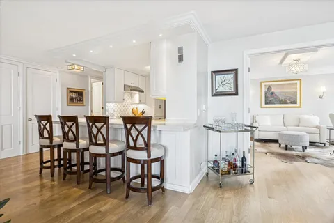 a very nice looking living room with furniture and wooden floor
