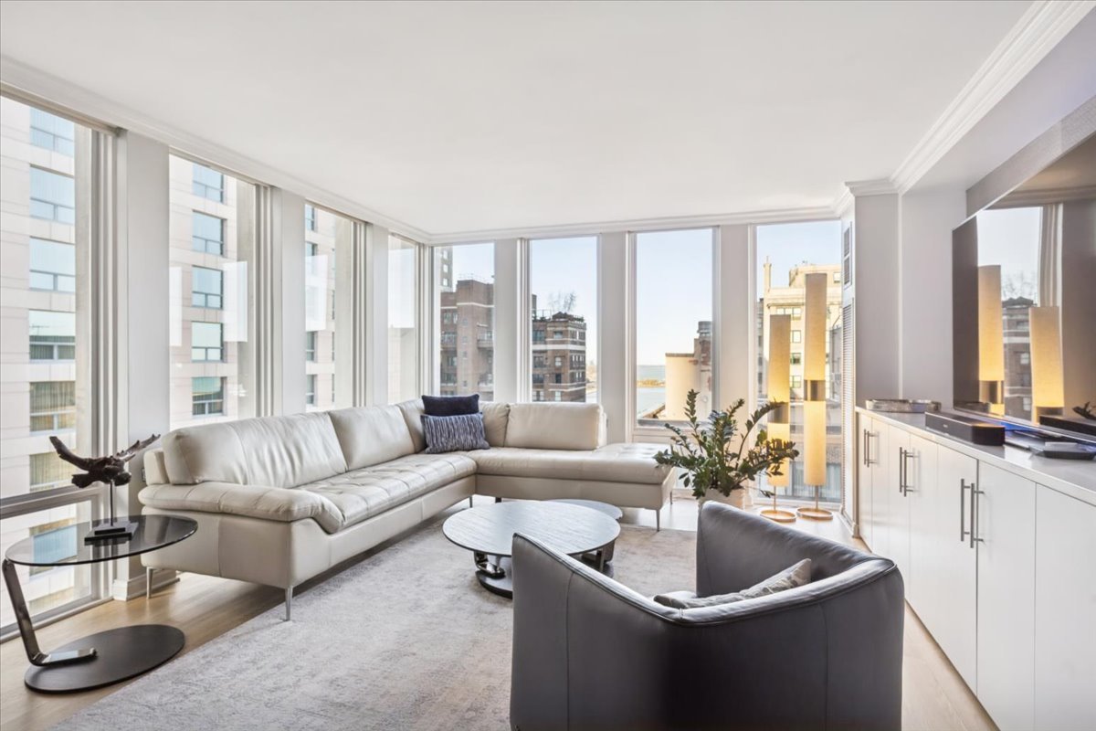 200 East Delaware Place, Unit 20A Chicago, IL 60611 - Photo 30 of 46 a living room with furniture and a large window