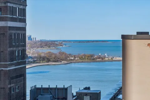 a view of a balcony with an ocean view