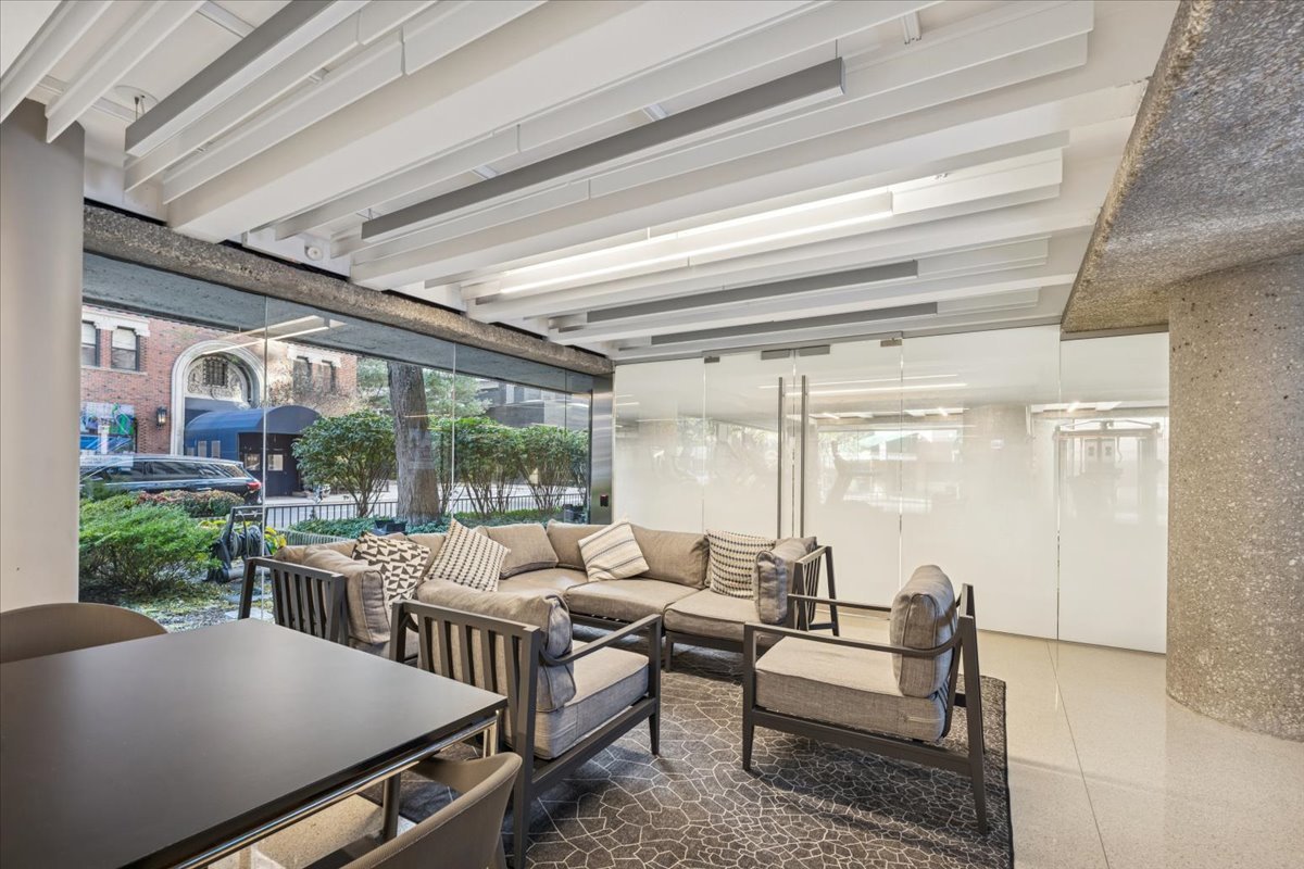 200 East Delaware Place, Unit 20A Chicago, IL 60611 - Photo 39 of 46 a living room with furniture and a table