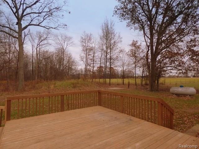 2220 Layton Road Fowlerville, MI 48836 - Photo 24 of 32 23 - 264-023171 DECK AND YARD.jpg