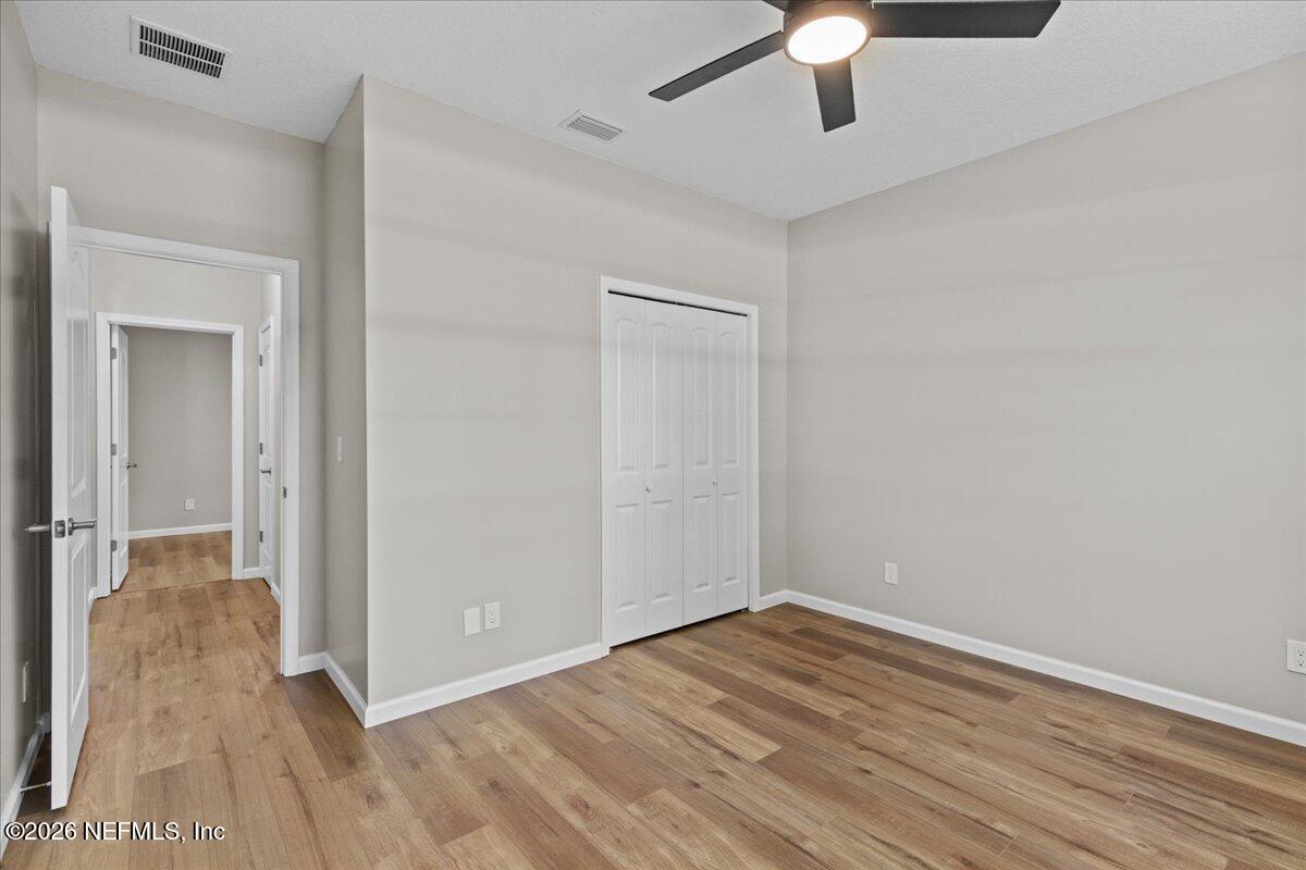 2462 Viola Street Middleburg, FL 32068 - Photo 27 of 61 wooden floor in an empty room