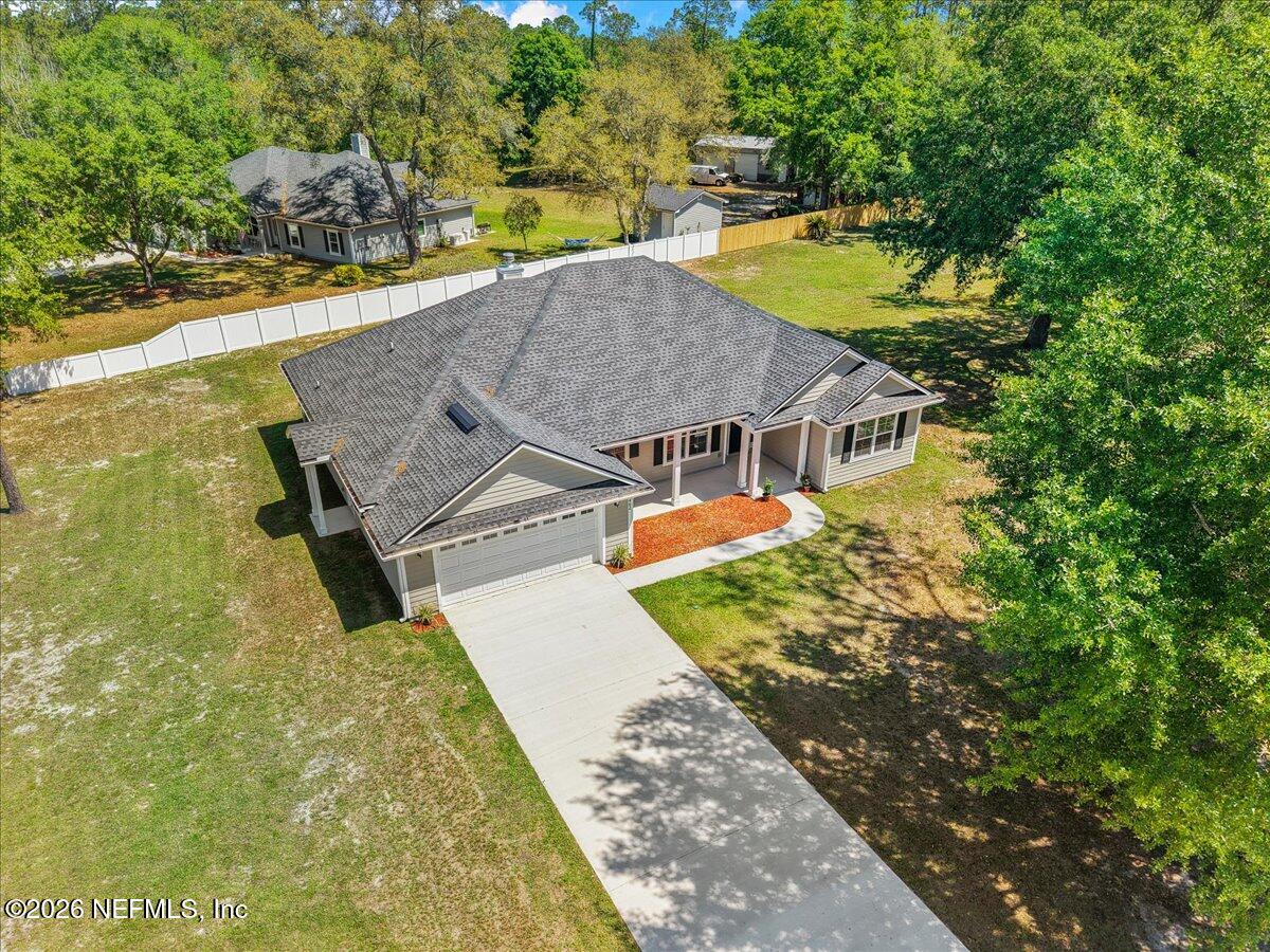 2462 Viola Street Middleburg, FL 32068 - Photo 42 of 61 a view of a swimming pool with a patio