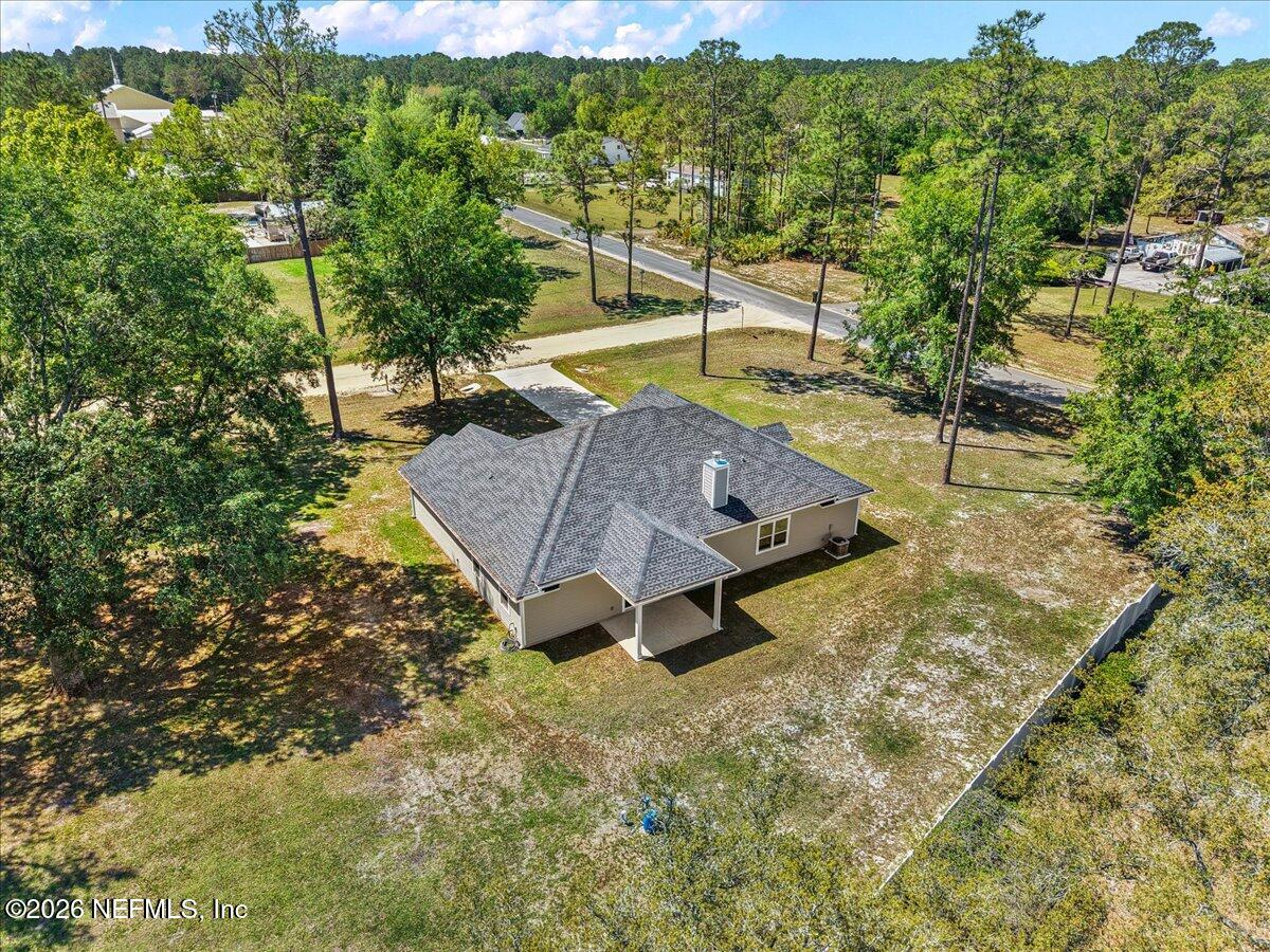 2462 Viola Street Middleburg, FL 32068 - Photo 43 of 61 a view of a yard with an outdoor space