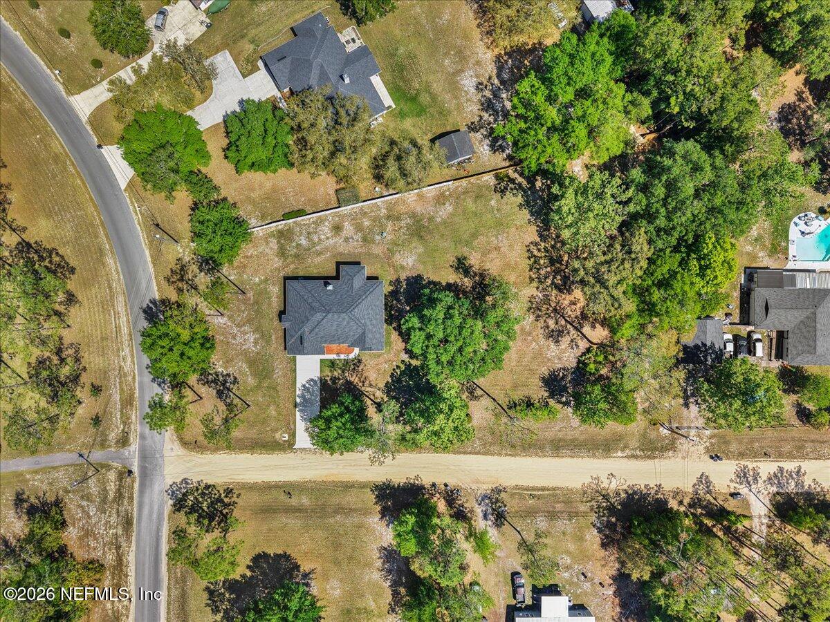 2462 Viola Street Middleburg, FL 32068 - Photo 45 of 61 an aerial view of a house with a yard