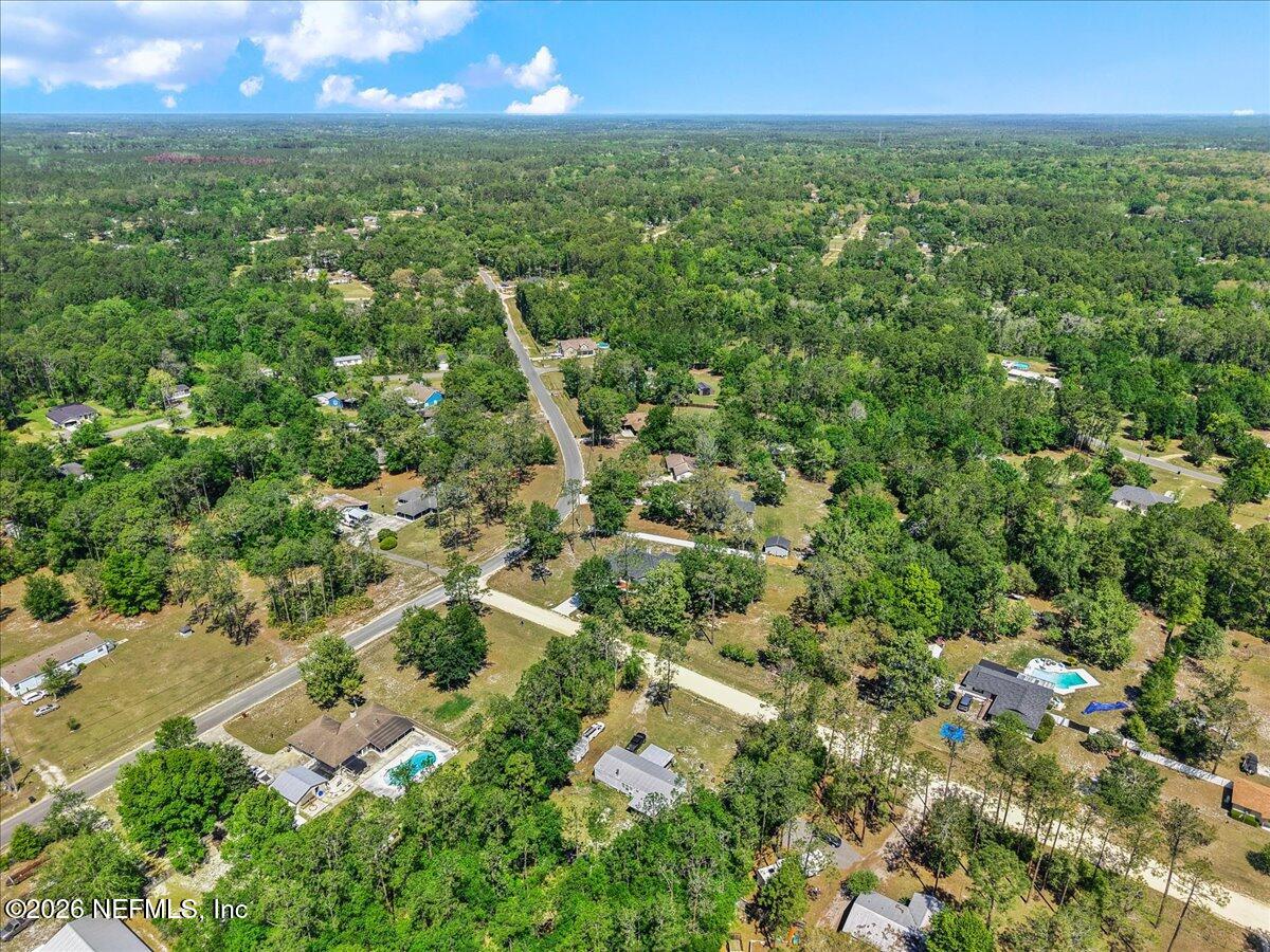 2462 Viola Street Middleburg, FL 32068 - Photo 49 of 61 an aerial view of residential houses with outdoor and green space