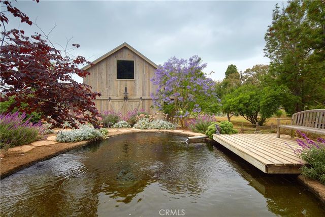 a view of a wooden deck with a bench