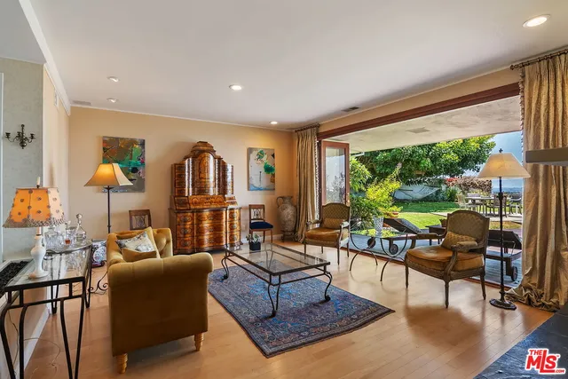 a view of a chairs and table in patio